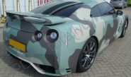 Nissan GTR vinyl wrapped in an arctic camo style car wrap
