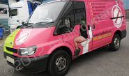 SWB Ford Transit fully wrapped in printed pink and green design by Totally Dynamic North London
