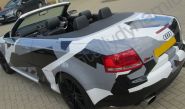 Audi RS4 vinyl wrapped in a printed grey camouflage car wrap
