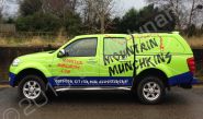 Nissan Navara fully vinyl wrapped for Mountain Munchkins in a printed vehicle wrap by Totally Dynamic Manchester