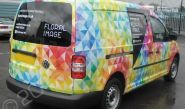 VW Caddy van fully vinyl wrapped for Floral Image in a printed vehicle wrap design by Totally Dynamic North London