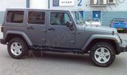 Jeep Wrangler fully vinyl wrapped in a matt metallic grey car wrap