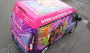Ford Transit fully vinyl wrapped for Angels Fancy Dress in a printed van wrap design by Totally Dynamic North London