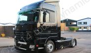 Mercedes Actros tractor unit fully vinyl wrapped in gloss black wrapping film by Totally Dynamic Norfolk