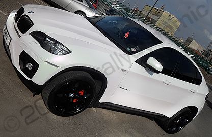 BMW X6 wrapped in two tone pearl white wrapped by Totally Dynamic North London