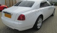 Rolls Royce Ghost fully wrapped in a gloss white vinyl car wrap