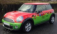 MINI One fully wrapped in a printed vinyl vehicle wrap design by Totally Dynamic Manchester