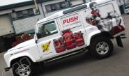 Land Rover Defender fully wrapped in a printed vinyl car wrap for Push Supplements by Totally Dynamic North London