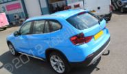 BMW X1 fully wrapped in printed colour-matched baby blue vinyl by Totally Dynamic North London
