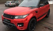 Range Rover Sport Autobiography with a red chrome vinyl car wrap