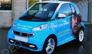 Smart Car fully vinyl wrapped in a printed design for Orphans in Need by Totally Dynamic Leeds