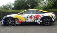 BMW i8 fully vinyl wrapped for Cosatto in a printed vehicle wrap design by Totally Dynamic Manchester