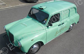 mint-green-taxi-vinyl-wrap.jpg