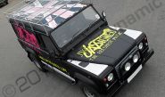 Defender Land Rover 110 LWB wrapped matte black and printed by Totally Dynamic North London