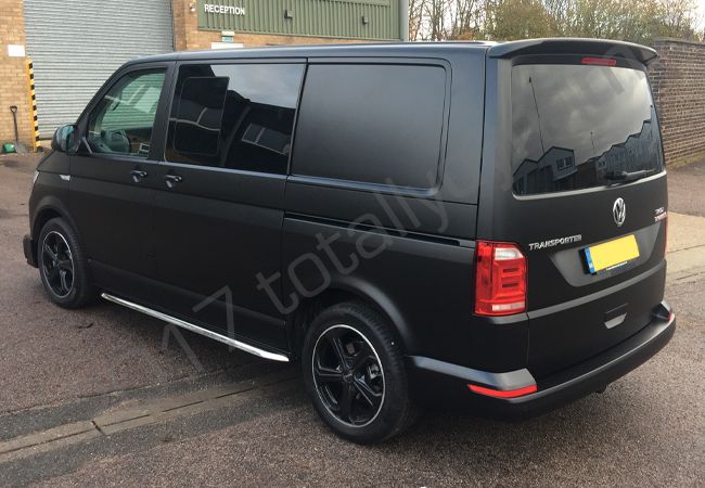 VW Transporter vinyl wrapped in a satin black van wrap