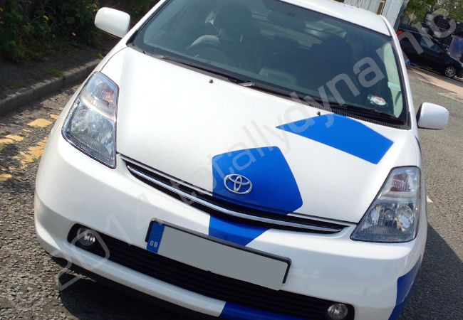 Toyota Prius fleet fully vinyl wrapped in a printed vehicle wrap design by Totally Dynamic Manchester