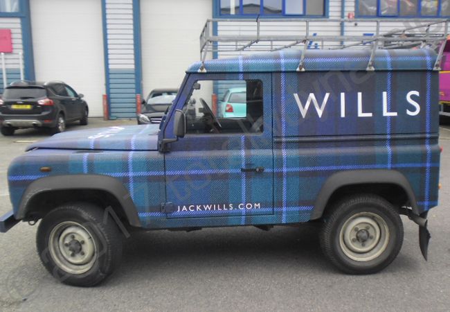 Land Rover Defender vinyl wrapped for Jack Wills in a tartan car wrap