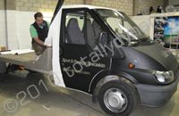 Ford Transit flatbed wrapped matt black plus graphics by Totally Dynamic Leicester