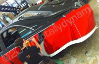 Maybach wrapped in red chrome with black grill by Totally Dynamic North London