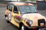 Taxi - designed and wrapped by Totally Dynamic Central Scotland