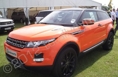 Range Rover Evoque wrapped in gloss orange vinyl by Totally Dynamic Lincolnshire