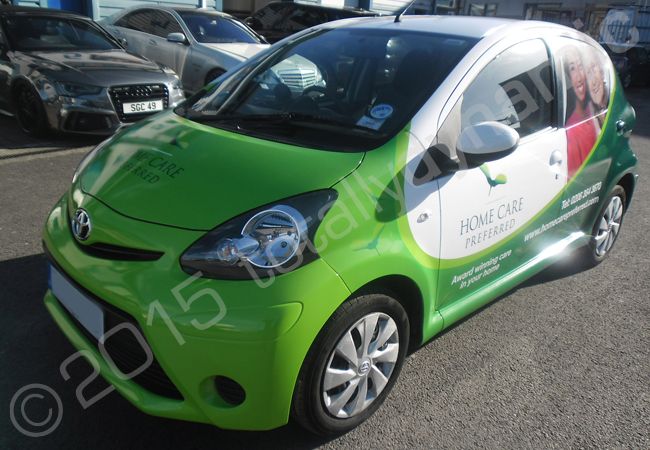 Toyota Aygo fully vinyl wrapped for Home Care Preferred in a printed vehicle wrap design by Totally Dynamic North London
