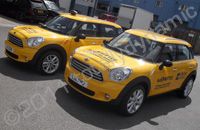 Mini Countryman Coopers wrapped in NY taxi wraps by Totally Dynamic North London