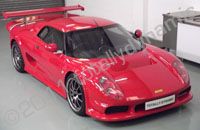Noble M12 wrapped white with white carbon fibre by Totally Dynamic Lincoln