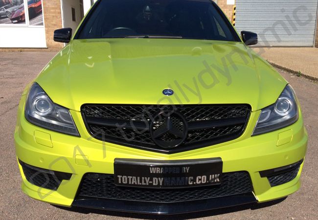 Mercedes C63 AMG vinyl wrapped in electric lime green