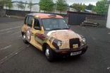 Taxi - designed and wrapped by Totally Dynamic Central Scotland