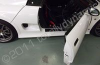 Noble M12 wrapped white with white carbon fibre by Totally Dynamic Lincoln