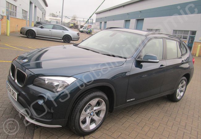 BMW X3 fully vinyl wrapped for Breckon & Breckon in a printed vinyl car wrap design by Totally Dynamic South London