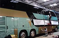 Tour Bus wrapped in metallic gold with print and cut graphics by Totally Dynamic South London