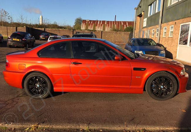 BMW M3 fully vinyl wrapped in gloss burnt orange
