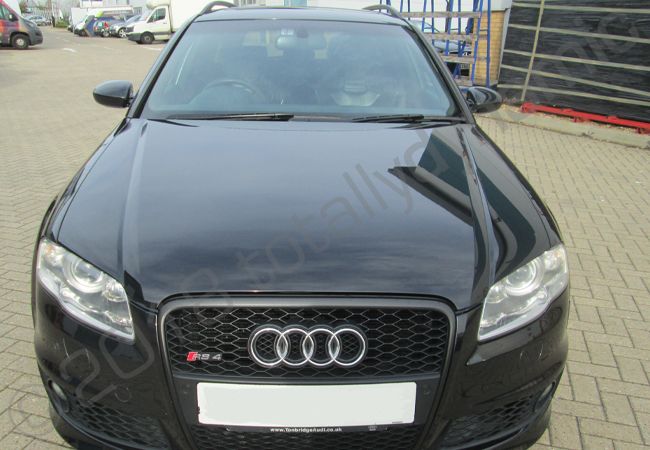 Audi RS4 fully wrapped in a satin black vinyl car wrap