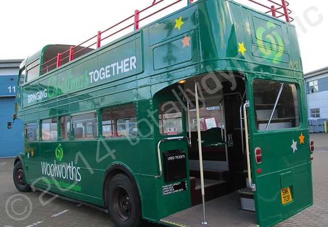 Routemaster bus fully vinyl wrapped in a printed vehicle wrap design for Woolworths by Totally Dynamic South London