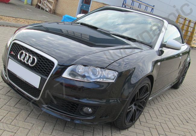 Audi RS4 vinyl wrapped in a printed grey camouflage car wrap