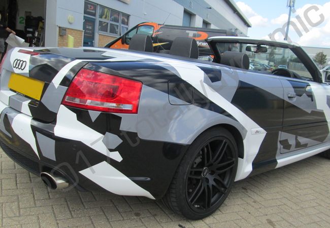 Audi RS4 vinyl wrapped in a printed grey camouflage car wrap