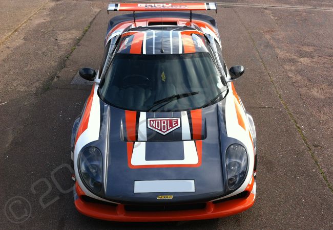 Noble M12 in a full motorsport vinyl car wrap