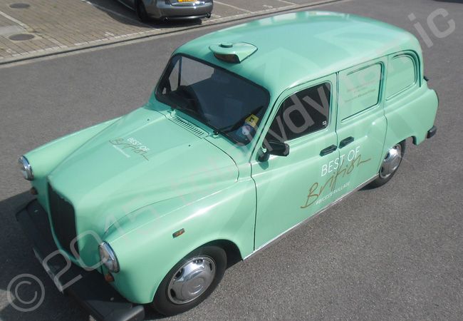 London Taxi fully wrapped in a printed vinyl taxi wrap for Bicester Village by Totally Dynamic North London
