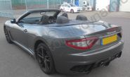 Maserati GT fully vinyl wrapped in a gloss metallic grey car wrap