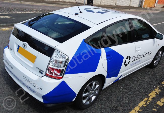 Toyota Prius fleet fully vinyl wrapped in a printed vehicle wrap design by Totally Dynamic Manchester