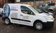 Citroen Berlingo van wrapped in printed vinyl part-wrap for EMC by Totally Dynamic Norfolk.