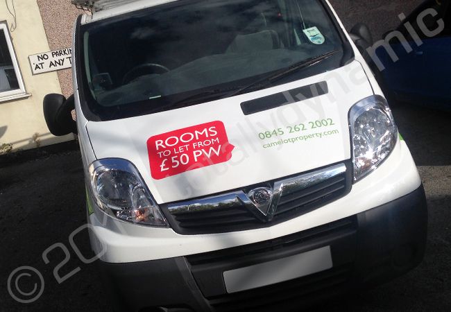 Vauxhall VivaroÂ part-wrapped in a printed van wrap design for Camelot Property Management by Totally Dynamic Manchester