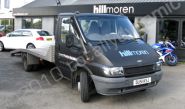 Ford Transit flatbed wrapped matt black plus graphics by Totally Dynamic Leicester