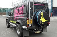 Defender Land Rover 110 LWB wrapped matte black and printed by Totally Dynamic North London