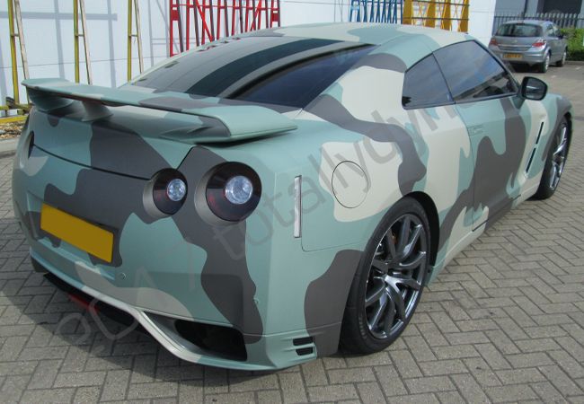 Nissan GTR vinyl wrapped in an arctic camo style car wrap