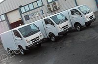 TATA van fleet wrapped in black and red with cut vinyl graphics by Totally Dynamic North London
