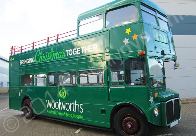 Routemaster bus fully vinyl wrapped in a printed vehicle wrap design for Woolworths by Totally Dynamic South London