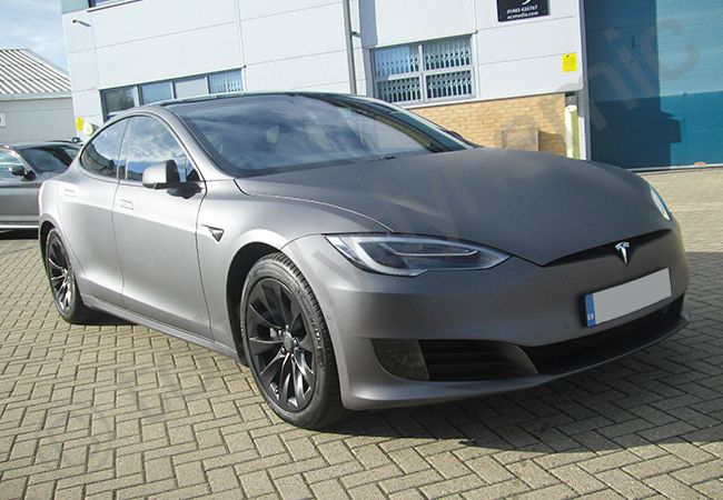 Tesla Model S fully vinyl wrapped in dark matt metallic grey